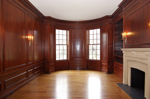Library with Mahogany Paneling and Limestone Fireplace - Historic Preservation 