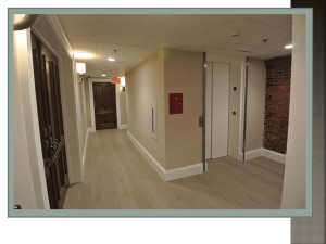 Private Elevator Entrance Hallway. 199 State Street Renovation Project 2015. Connaughton Construction.